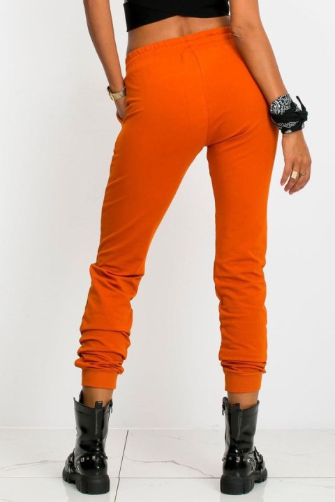 Spodnie damskie dresowe Model RV-DR-5040.07X Dark Orange - BFG Spodnie damskie dresowe Model RV-DR-5040.07X Dark Orange - BFG