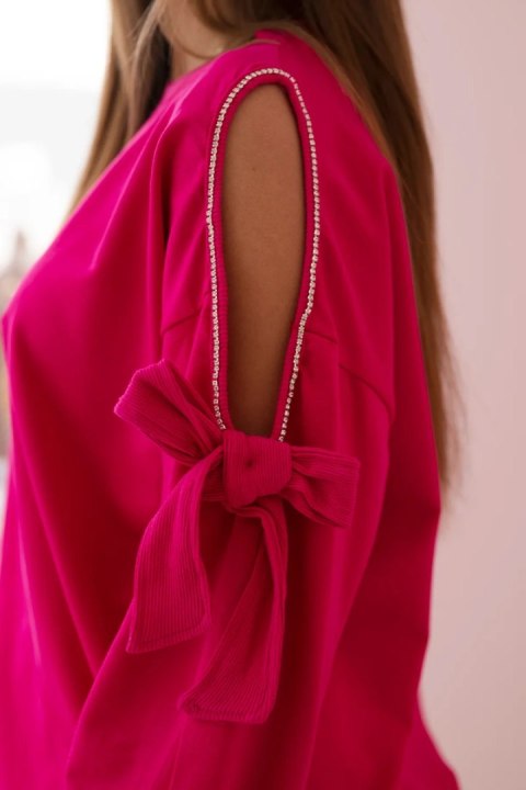 Komplet bluzy z kokardą na rękawach i legginsów fuksja Komplet bluzy z kokardą na rękawach i legginsów fuksja
