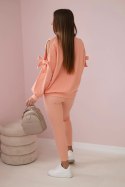 Komplet bluzy z kokardą na rękawach i legginsów łososiowy  