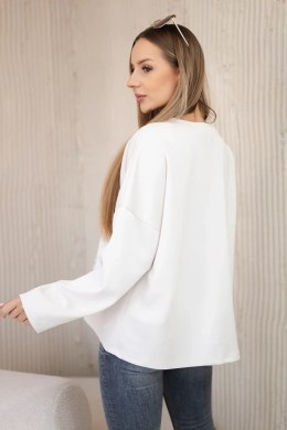 Bluza masełko z ozdobnym kwiatem beżowa  