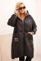 Kurtka damska Plus Size pikowana z kapturem i sportowymi mankietami czarna  