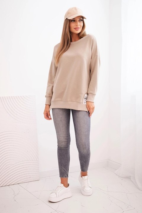 Bluza damska oversize z długim rękawem jasno beżowa Bluza damska oversize z długim rękawem jasno beżowa