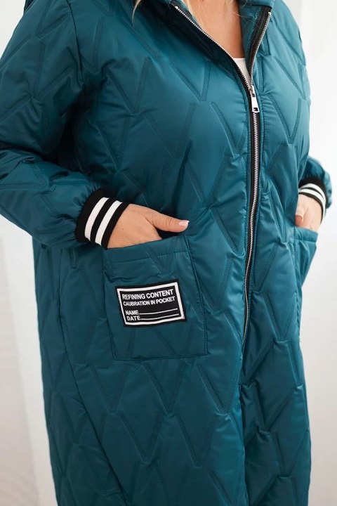 Kurtka damska Plus Size pikowana z kapturem i sportowymi mankietami morska Kurtka damska Plus Size pikowana z kapturem i sportowymi mankietami morska