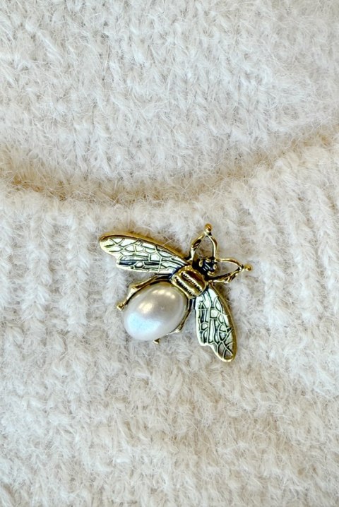 628-1 Modny kardigan oversize z ozdobną broszką i praktycznymi kieszeniami - beżowy