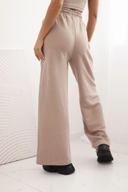 Spodnie damskie bawełniane z szeroką nogawką i kieszeniami beżowe
