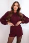 Elegancki damski kombinezon z paskiem i długim rękawem bordowy