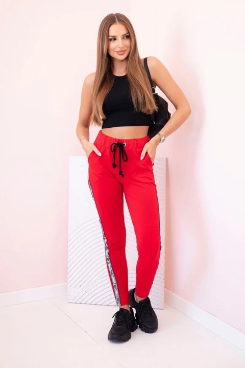 Spodnie damskie dresowe z lampasem i wiązaniem w pasie czerwone  