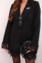Marynarka damska z koronką na dole i przy mankietach czarna