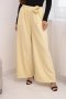 Spodnie damskie eleganckie z szeroką nogawką i ozdobnym kwiatem żółte