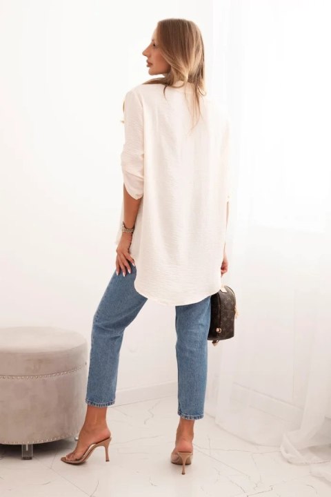 Bluzka z dłuższym tyłem jasno beżowa