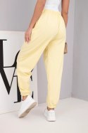 Spodnie damskie bawełniane z wysokim stanem i ozdobnym guzikiem żółte