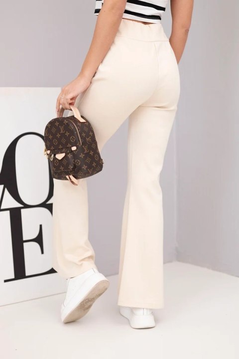 Spodnie damskie masełko z rozszerzaną nogawką beżowe