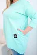 Bluzka damska Plus Size z dłuższym tyłem i długim rękawem miętowa