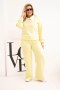 Komplet damski masełko Plus Size z szerokimi nogawkami i kołnierzykiem żółty