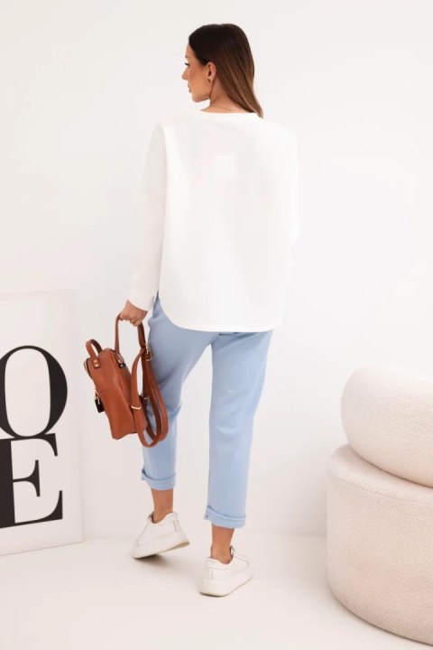 Komplet damski masełkowy z kontrastową kieszonką niebieski