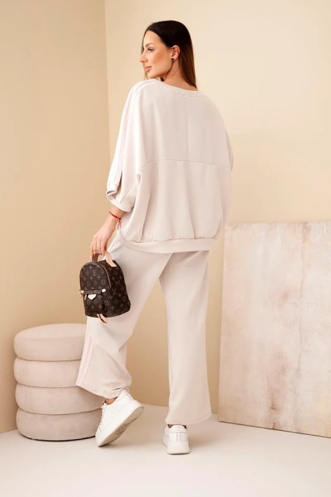 Komplet damski wiskozowy masełko z szeroką nogawką i luźną bluzą beżowy